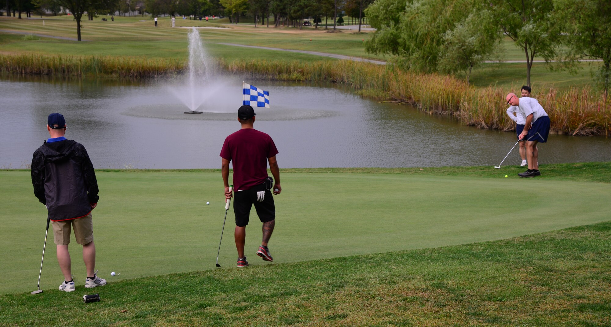 Golfers take part in the Osan Cup Golf Tournament Sept. 29, 2015, at Osan Air Base, Republic of Korea. Many Team Osan members were able to take a day off, play their favorite sport or game, and focus on resiliency during the two-day event. (U.S. Air Force photo by Staff Sgt. Benjamin Sutton)