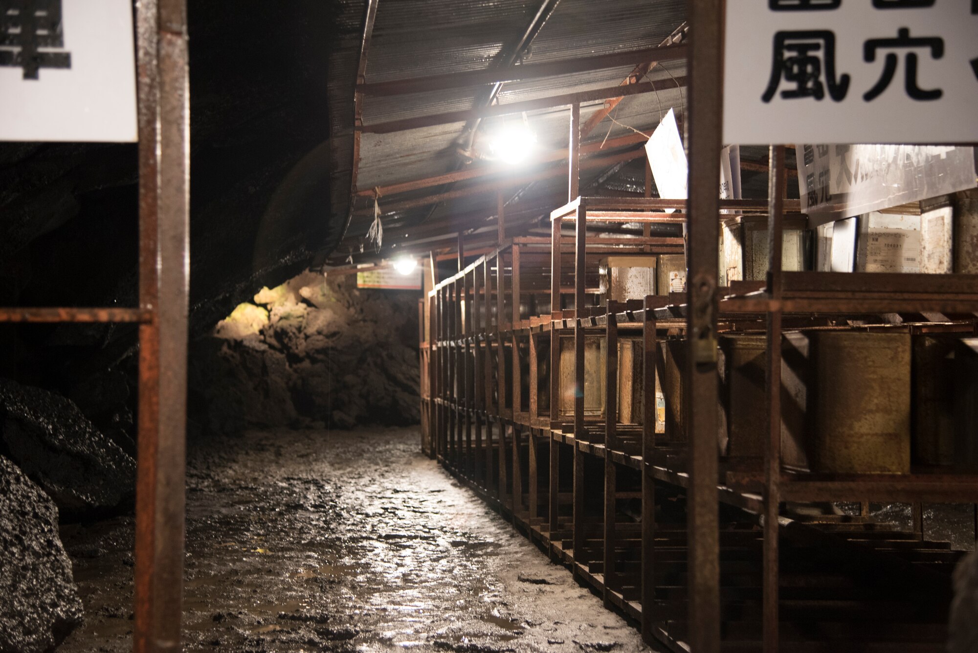 An ancient shelving unit sits on display at the Fugaku Fuketsu Wind Cave in Yamanashi, Japan, Sept. 5, 2015. Up until the beginning of the Showa era, the cave was used as a refrigerator to store silkworm eggs. The cold air keeps the silkworms from changing into moths, which in turn extends the time the silkworm can produce silk. (U.S. Air Force photo by Senior Airman Michael Washburn/Released)