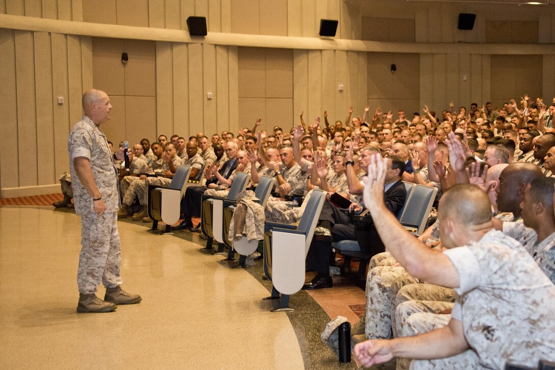 Commandant of the Marine Corps, Gen. Robert B. Neller, speaks to Marines with Training and Education Command, Marine Corps Combat Development Command, Combat Development and Integration at Little Hall, Marine Corps Base Quantico, Va., Oct. 1, 2015. Neller spoke about readiness, training, Naval integration, modernization and technology. (U.S. Marine Corps photo by Sgt. Gabriela Garcia/Released)