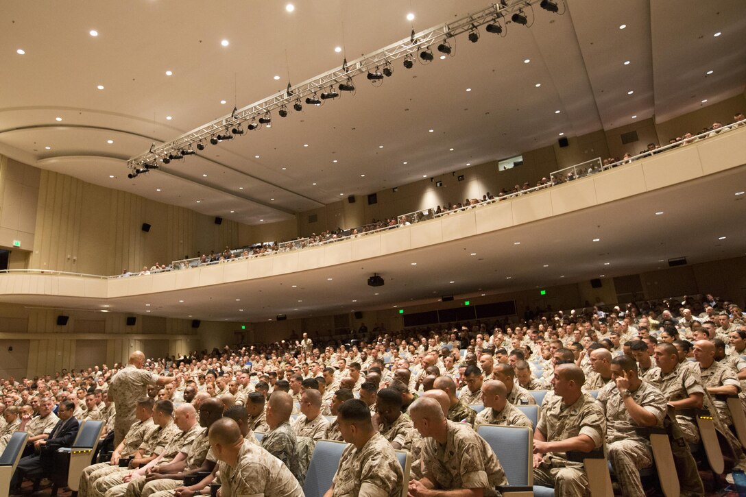 Commandant of the Marine Corps, Gen. Robert B. Neller, speaks to Marines with Training and Education Command, Marine Corps Combat Development Command, Combat Development and Integration at Little Hall, Marine Corps Base Quantico, Va., Oct. 1, 2015. Neller spoke about readiness, training, Naval integration, modernization and technology. (U.S. Marine Corps photo by Sgt. Gabriela Garcia/Released)