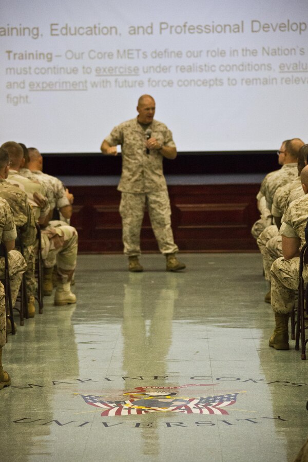 Commandant of the Marine Corps, Gen. Robert B. Neller, speaks to Marines with Marine Corps University at Ellis Hall, Marine Corps Base Quantico, Va., Oct. 1, 2015. Neller spoke about readiness, training, Naval integration, modernization and technology. (U.S. Marine Corps photo by Sgt. Gabriela Garcia/Released)