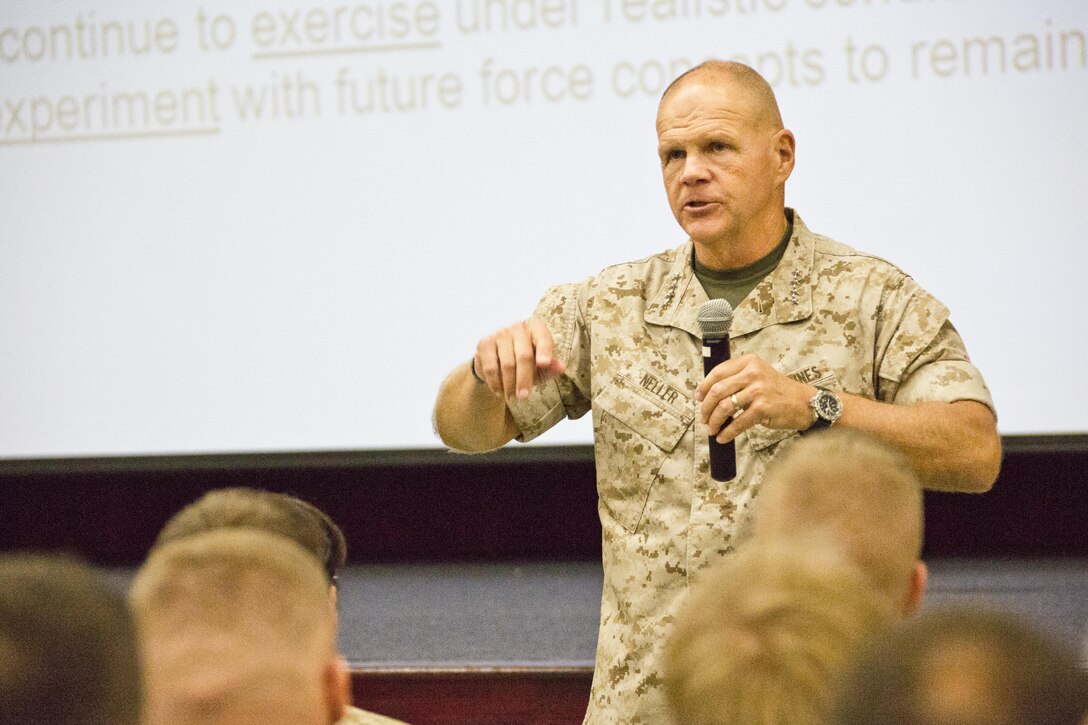 Commandant of the Marine Corps, Gen. Robert B. Neller, speaks to Marines with Marine Corps University at Ellis Hall, Marine Corps Base Quantico, Va., Oct. 1, 2015. Neller spoke about readiness, training, Naval integration, modernization and technology. (U.S. Marine Corps photo by Sgt. Gabriela Garcia/Released)