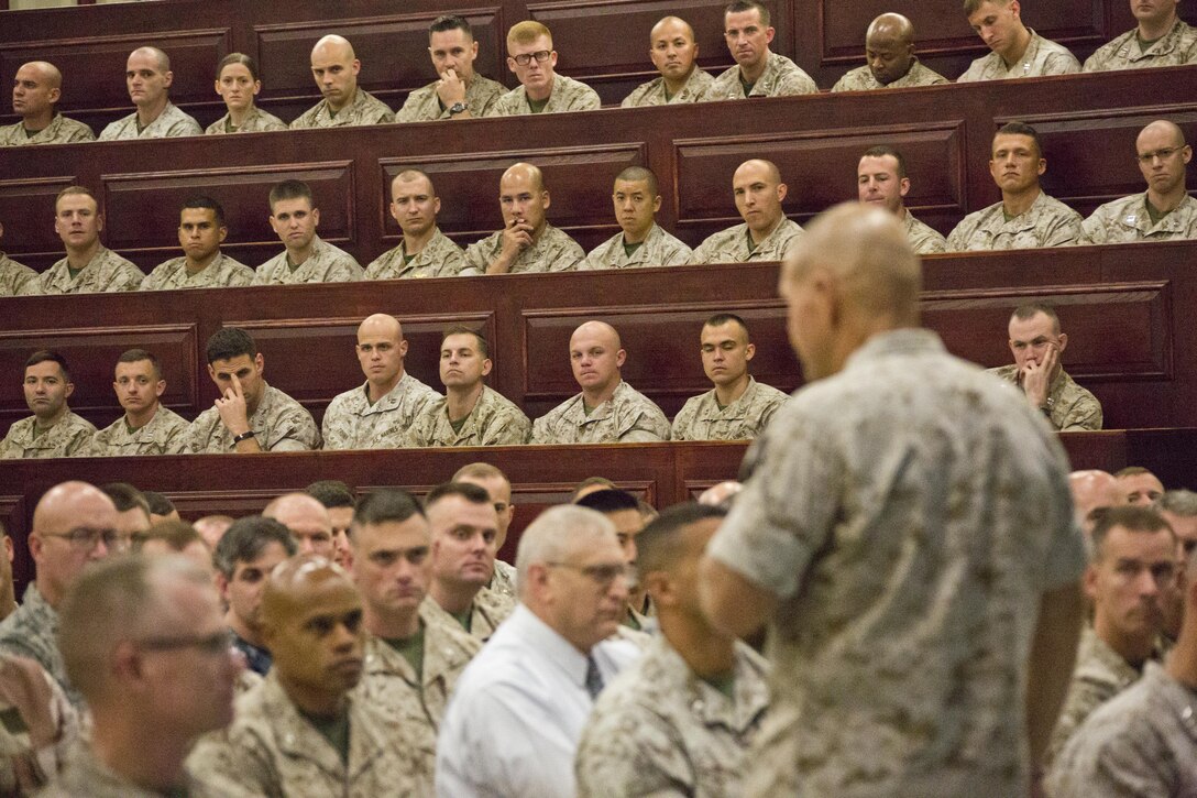 Commandant of the Marine Corps, Gen. Robert B. Neller, speaks to Marines with Marine Corps University at Ellis Hall, Marine Corps Base Quantico, Va., Oct. 1, 2015. Neller spoke about readiness, training, Naval integration, modernization and technology. (U.S. Marine Corps photo by Sgt. Gabriela Garcia/Released)