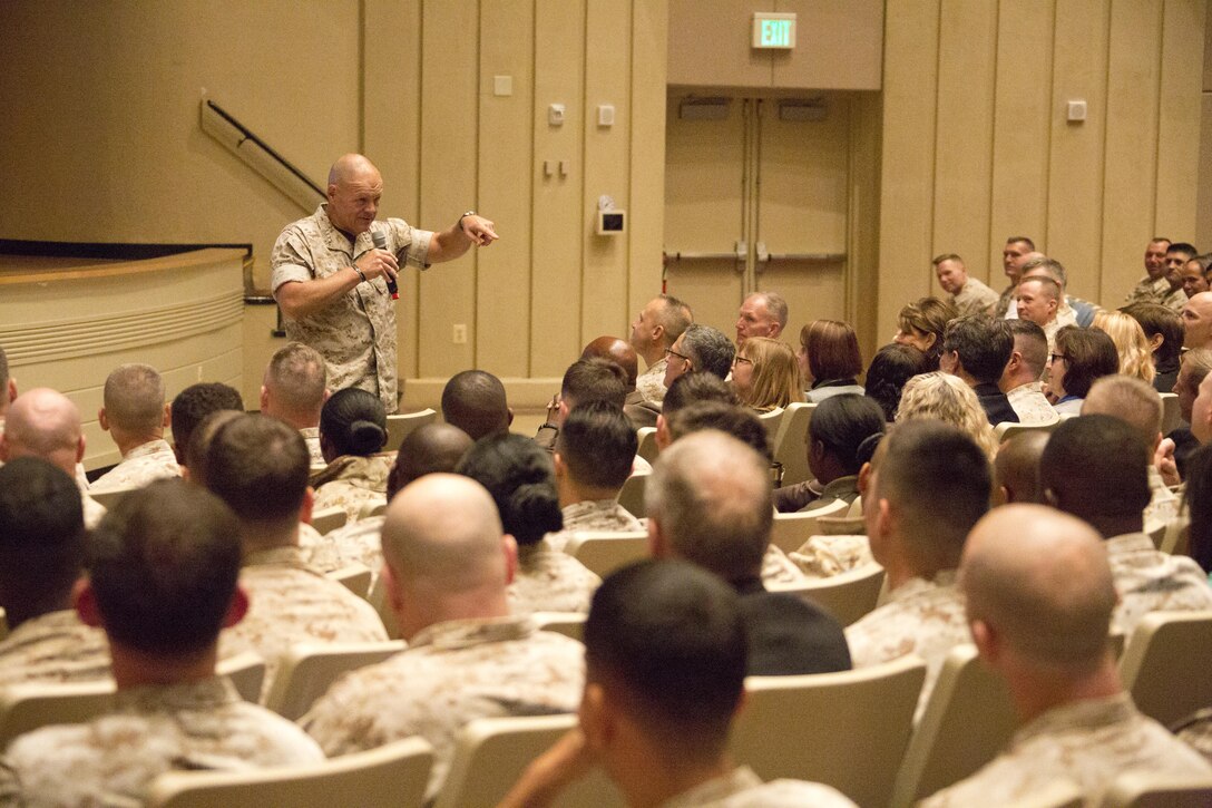 Commandant of the Marine Corps, Gen. Robert B. Neller, speaks to Marines, Sailors and civilians at Little Hall, Marine Corps Base Quantico, Va., Oct. 1, 2015. Neller spoke about readiness, training, Naval integration, modernization and technology. (U.S. Marine Corps photo by Sgt. Gabriela Garcia/Released)