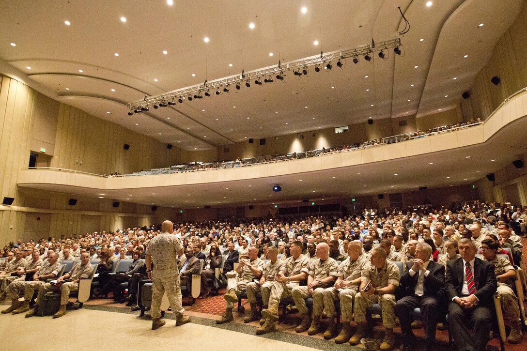 Commandant of the Marine Corps, Gen. Robert B. Neller, speaks to Marines, Navy Sailors and civilians at Little Hall, Marine Corps Base Quantico, Va., Oct. 1, 2015. Neller spoke about readiness, training, Naval integration, modernization and technology. (U.S. Marine Corps photo by Sgt. Gabriela Garcia/Released)