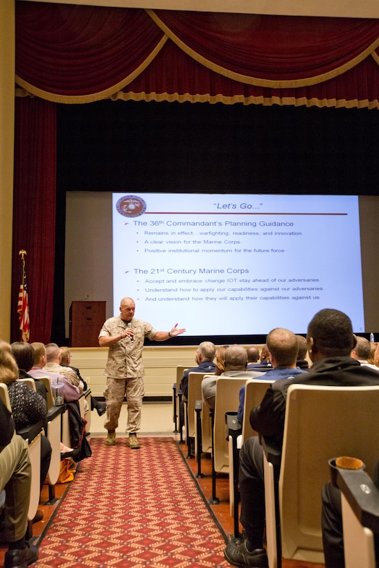 Commandant of the Marine Corps, Gen. Robert B. Neller, speaks to Marines, Navy Sailors and civilians at Little Hall, Marine Corps Base Quantico, Va., Oct. 1, 2015. Neller spoke about readiness, training, Naval integration, modernization and technology. (U.S. Marine Corps photo by Sgt. Gabriela Garcia/Released)