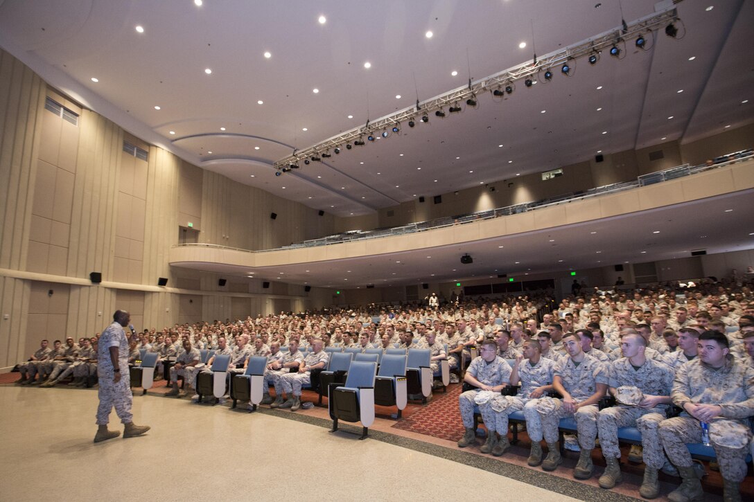 Sgt. Maj. of the Marine Corps Ronald L. Green, speaks to Marines, Sailors and civilians at Little Hall, Marine Corps Base Quantico, Va., Oct. 1, 2015. Neller spoke about readiness, training, Naval integration, modernization and technology. (U.S. Marine Corps photo by Sgt. Gabriela Garcia/Released)