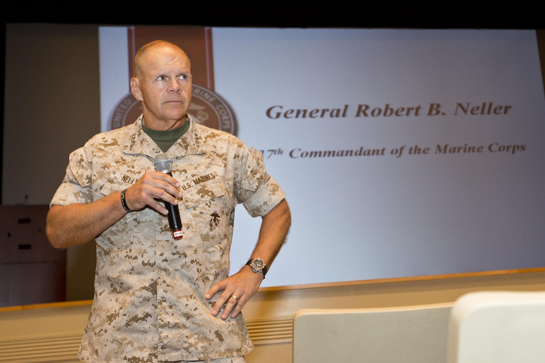 Commandant of the Marine Corps, Gen. Robert B. Neller, speaks to Marines, Navy Sailors and civilians at Little Hall, Marine Corps Base Quantico, Va., Oct. 1, 2015. Neller spoke about readiness, training, Naval integration, modernization and technology. (U.S. Marine Corps photo by Sgt. Gabriela Garcia/Released)