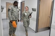Eric Kunawotor, 38, of Ghana, had never worked with a U.S. Army Reserve Soldier before he met Sgt. Josephine Charlotte Morton. He was impressed with her professionalism and eagerness to learn. (Photo by Staff Sgt. Rick Scavetta, 7th Mission Support Command)