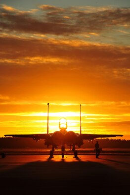 An F-15 Eagle from Seymour Johnson Air Force Base, N.C., sits on the flightline before an early morning training sortie Sept. 17, 2015, at Tyndall AFB, Fla. The unit traveled to Tyndall AFB to participate in the Combat Archer exercise, a weapons system evaluation program designed to test the effectiveness of our Airmen and air-to-air weapon system capability of combat aircraft. (U.S. Air Force photo/Senior Master Sgt. Beth Holliker)
