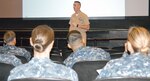 Command Master Chief Petty Officer Rich Curtis, director of the U.S. Navy Senior Enlisted Academy in Newport, R.I, speaks to San Antonio area chief petty officers at the Joint Base San Antonio-Randolph main auditorium as part of a 10-city, 24-day whirlwind tour of Navy fleet-concentration areas.  There are more than 10,000 active duty, reserve and student Navy Sailors, civilian employees and family members in the San Antonio area.