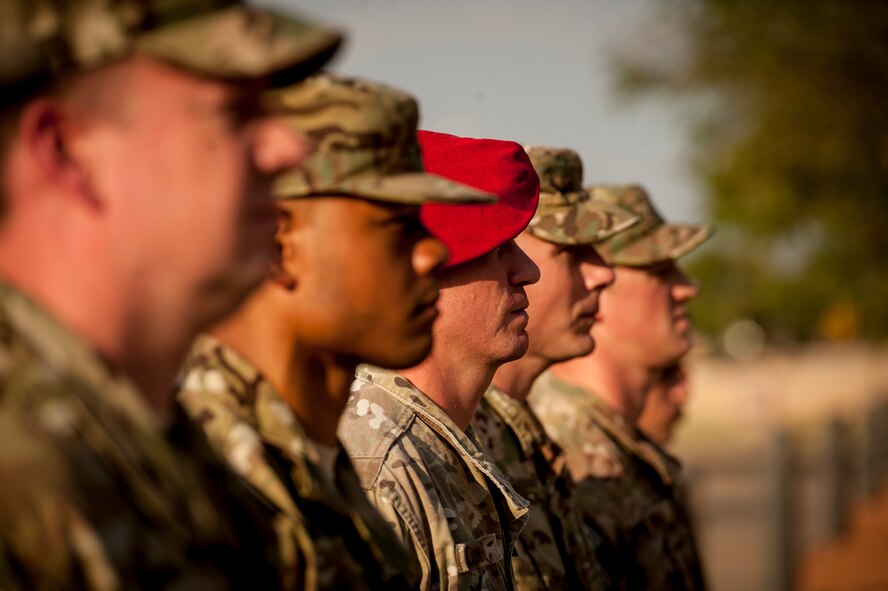 Members of the 26th Special Tactics Squadron stand in formation during a retreat ceremony dedicated to the memory of Senior Airman Mark Forester, Sept. 29, 2015 at Cannon Air Force Base, N.M. Forester was a Special Tactics combat controller who coordinated close air support for special operations teams in hostile environments. Forester was killed in action when he put himself in direct line of fire to save a teammate’s life in Afghanistan on Sept. 29, 2010. He posthumously received the Silver Star medal for his heroism in battle against an enemy of the United States. (U.S. Air Force photo/Tech. Sgt. Manuel J. Martinez)