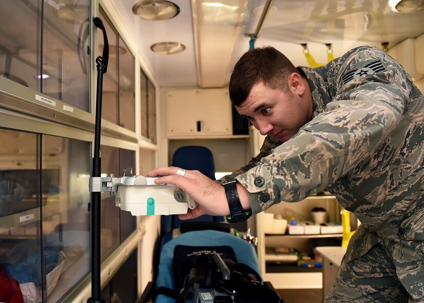 Staff Sgt. Matthew Gray, a 59th Medical Wing Emergency Medical Services paramedic, performs an operations check on the Perfuser Space Infusion Pump System Sept. 23, 2015, at the Wilford Hall Ambulatory Surgical Center, Joint Base San Antonio-Lackland. The 59th MDW Emergency Medical Services is the first in the Air Force to use the pumps to administer IV medications to patients on board ambulances. (U.S. Air Force photo/Staff Sgt. Jerilyn Quintanilla) 
