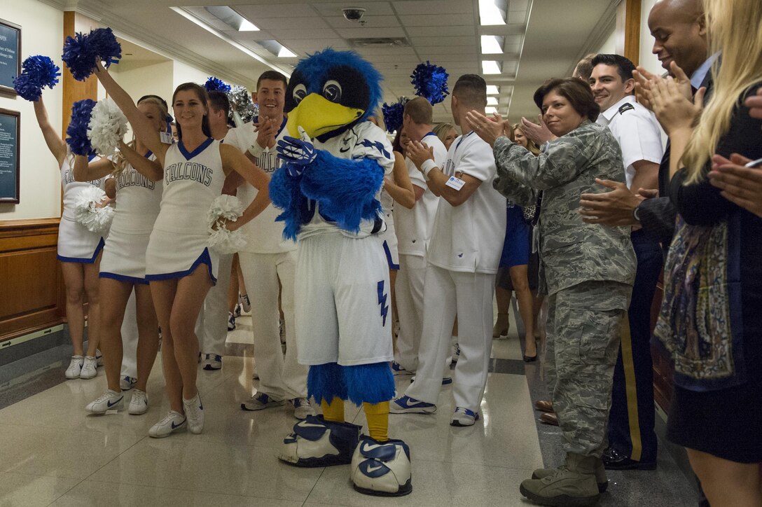 U.S. Air Force Academy cheerleaders, band members and mascot arrive at the Pentagon, Oct. 2, 2015, for a pep rally on the eve of the football game between the Air Force and Naval academies. DoD photo by U.S. Air Force Senior Master Sgt. Adrian Cadiz