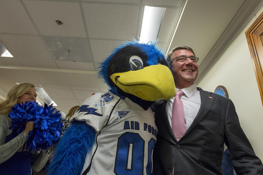 Defense Secretary Ash Carter poses with the U.S. Air Force Academy mascot during a pep rally at the Pentagon, Oct. 2, 2015. DoD photo by U.S. Air Force Senior Master Sgt. Adrian Cadiz