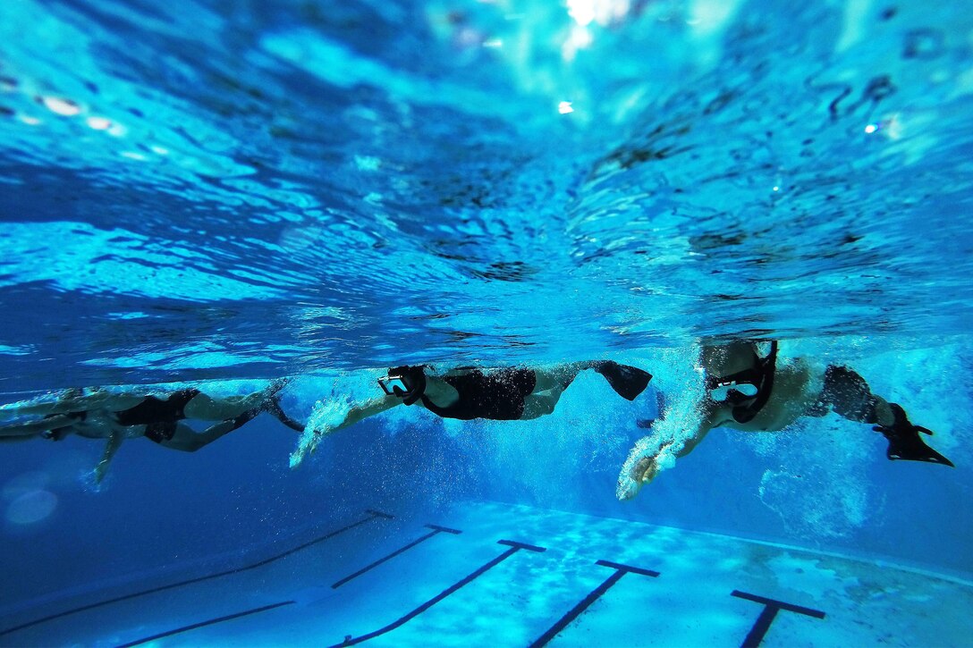 Sailors participate in conditioning training on Joint Base Pearl Harbor-Hickam, Hawaii, Oct. 1, 2015. The training aims to ensure that sailors and Coast Guardsmen in the middle Pacific operate at peak performance and form combat-ready forces capable of undertaking a broad spectrum of maritime missions. U.S. Navy photo by Petty Officer 2nd Class Johans Chavarro