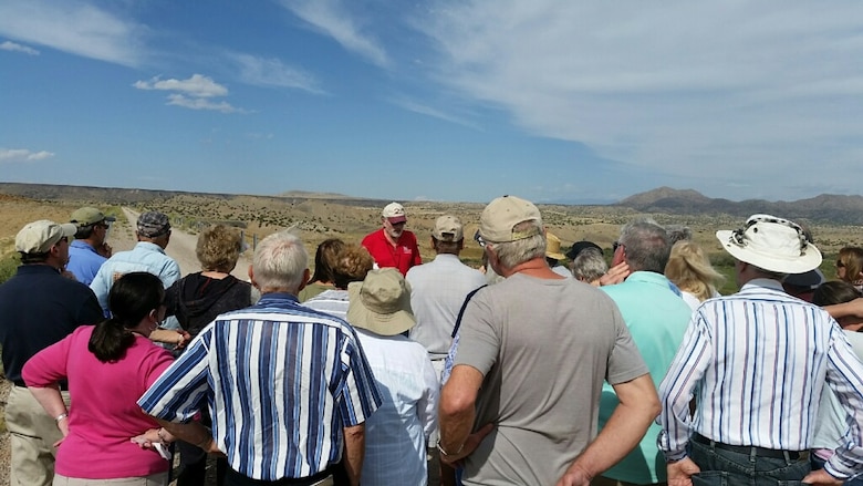 GALISTEO DAM, N.M. – District archaeologist Gregory Everhart conducts a tour of the Galisteo Project for attendees during the All Trails Lead to Santa Fe Conference, Sept. 20, 2015. 