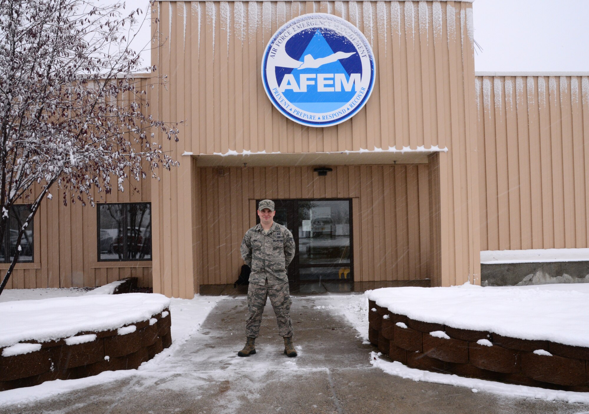 U.S. Air Force Senior Airman Sean Kirby, a 354th Civil Engineer Squadron emergency management journeyman, takes a quick break Sep. 29, 2015, at Eielson Air Force Base, Alaska. Kirby said serving in the Air Force is important to him because it gives him the opportunity to serve his country and follow in the same footsteps as his parents and grandparents. (U.S. Air Force photo by Airman 1st Class Cassandra Whitman/Released)