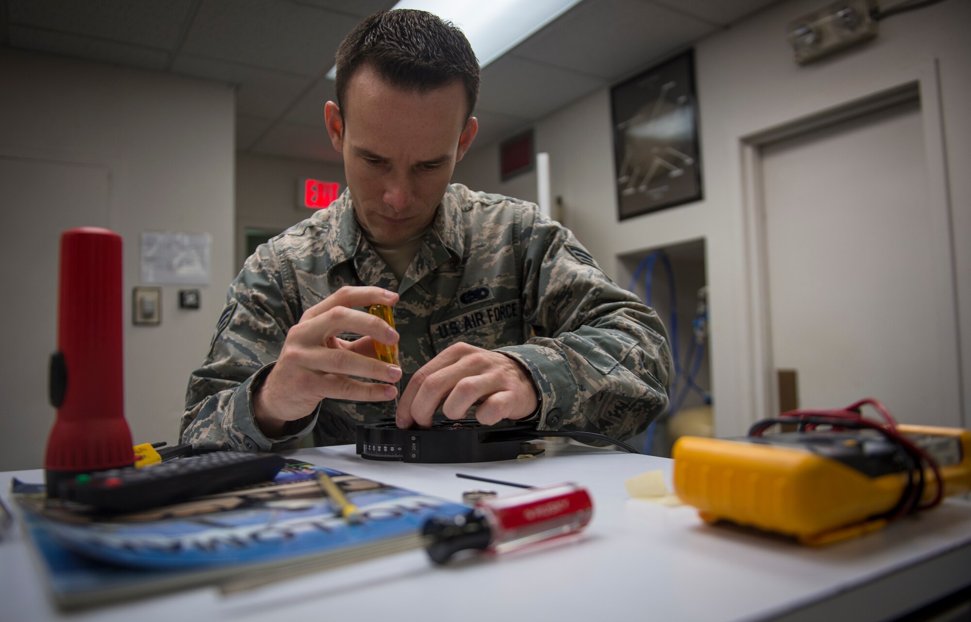 Senior Airman Samuel Davis, an airfield systems maintenance apprentice with the 2nd Weather Squadron, Det. 4, repairs the solar telescope’s polaroid servo for the automatic gain control at the Solar Observatory at Holloman Air Force Base, N.M., on Sept. 24. Davis is a depot-level maintenance technician who makes repairs on the three solar observatory telescopes around the world, the other two being in Learmonth, Australia and San Vito, Italy. (U.S. Air Force photo by Senior Airman Aaron Montoya)