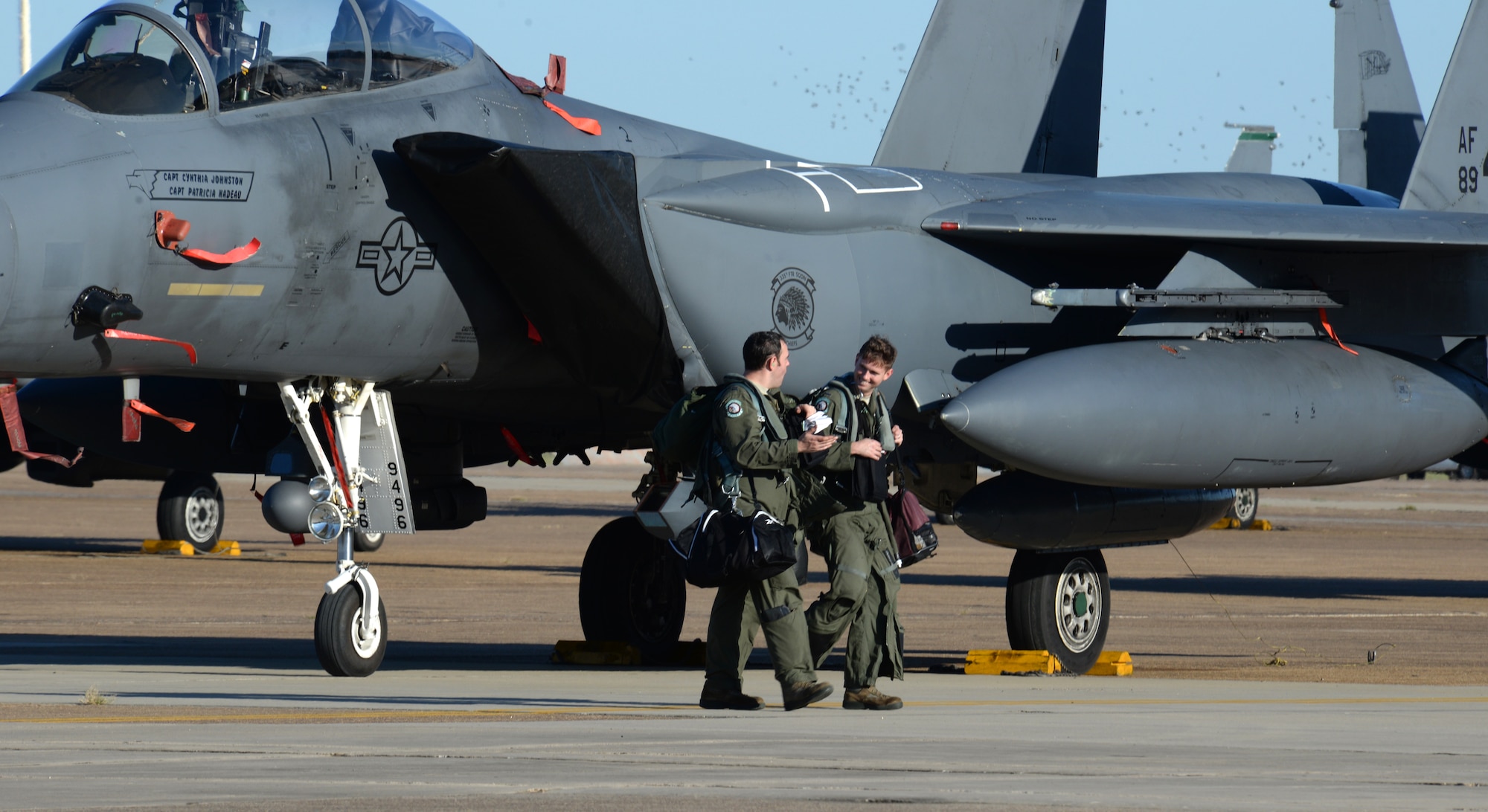 Aircrew depart an F-15E Strike Eagle at Barksdale Air Force Base, La., Oct. 1, 2015. Hundreds of aircrew and a large contingent of aircraft including Strike Eagles and KC-135 Stratotankers flew in from Seymour Johnson AFB, N.C., to avoid potential damage from high winds associated with Hurricane Joaquin, a Category 4 storm with winds up to 130 mph. (U.S. Air Force photo/Airman 1st Class Curt Beach)