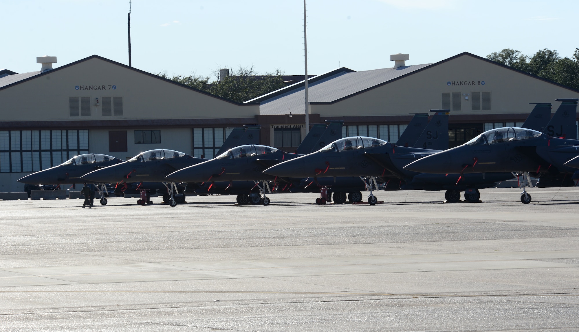 Five F-15E Strike Eagles rest on the flightline at Barksdale Air Force Base, La., Oct. 1, 2015. More than 60 aircraft from Seymour Johnson AFB, N.C., were relocated to avoid potential damage from Hurricane Joaquin along the East Coast. (U.S. Air Force photo/Airman 1st Class Curt Beach)