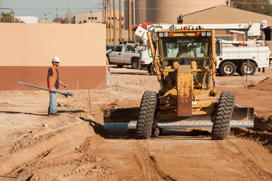 Construction workers prepare the foundation for a new medical clinic at Holloman Air Force Base on Sept. 19. The 49th Medical Group began construction in July to replace their 44-year-old facility and consolidate services from five outlying buildings. The new medical clinic is expected to be completed by November 2017. (U.S. Air Force photo by Airman 1st Class Randahl J. Jenson)
