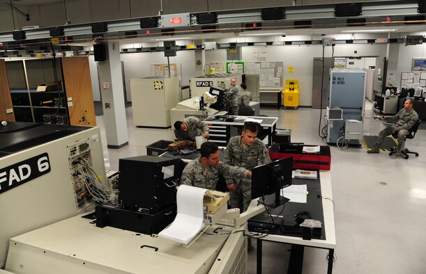 Avionics backshop crewmembers complete tasks at Whiteman Air Force Base, Mo., Oct. 1, 2015. The shop performs testing and maintenance on B-2 Spirit avionics and test station components to ensure successful operation. (U.S Air Force photos by Senior Airman Keenan Berry/Released)