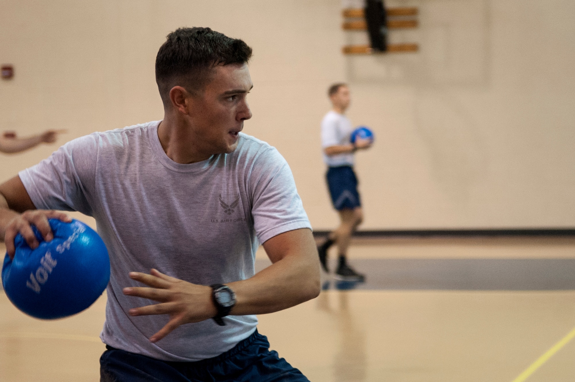 Airman 1st Class Domenic Martino, 4th Civil Engineer Squadron explosive ordnance disposal technician, prepares to throw a ball during Comprehensive Airman Fitness Day, Sept. 30, 2015, at Seymour Johnson Air Force Base, North Carolina. The 4th CES played against a team from the 911th Air Refueling Squadron during the dodgeball tournament. (U.S. Air Force photo/Airman Shawna L. Keyes)  