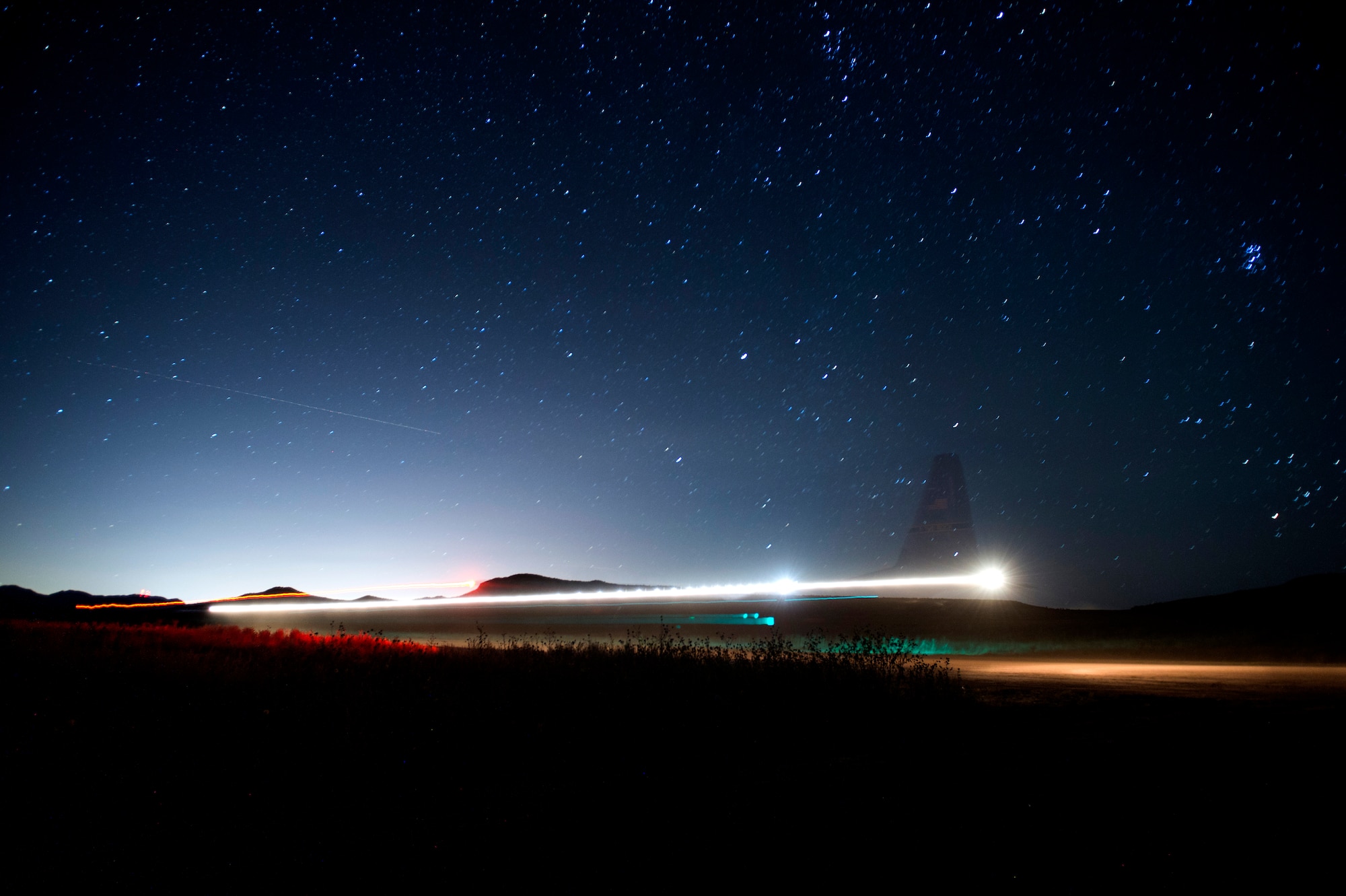 A C-130 aircraft from the 19th Airlift Wing at Little Rock Air Force Base, AR., lands Red Devil Landing Zone, Colo., during Exercise Cerberus Strike, on September 15, 2015. Approximately 150 Airmen from the 821st Contingency Response Group at Travis Air Force Base, Calif., participated in a first-of-its-kind Joint contingency response exercise from Sept. 8-19 at five locations (Southern California Logistics Airfield, Calif., Freedom Landing Zone, Calif., Gunnison Region Airfield, Colo., Red Devil Landing Zone, Colo., Peterson Air Force Base, Colo., and Fort Carson, Colo.). During the training, 821st CRG Airmen supported more than 275 Soldiers from Fort Carson, Colo., during air drop missions, helicopter training, coordinated Apache air support, and personnel and equipment airlift training. The Contingency Response (CR) training was constructed to primarily develop unique CR-oriented training objectives to improve down range effectiveness in preparation for real-world responses. (U.S. Air Force Photos by Tech. Sgt. Matthew Hannen)