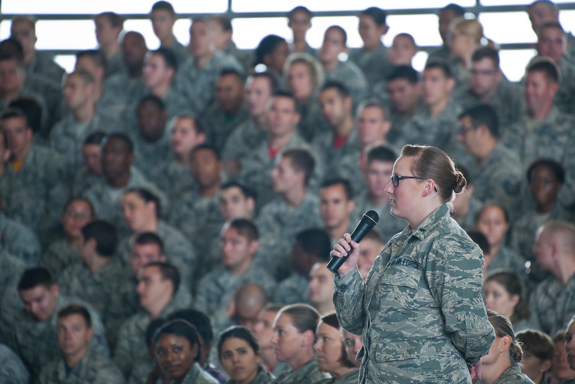 A lieutenant with the 96th Medical Group asks a question to Air Force Chief of Staff Gen. Mark A. Welsh III and Chief Master Sgt. of the Air Force James Cody during an “All Call” Oct. 2 at Eglin Air Force Base, Fla.  The Air Force leaders visited Eglin and Hurlburt Field, to engage with Airmen.  (U.S. Air Force photo/Samuel King Jr.)