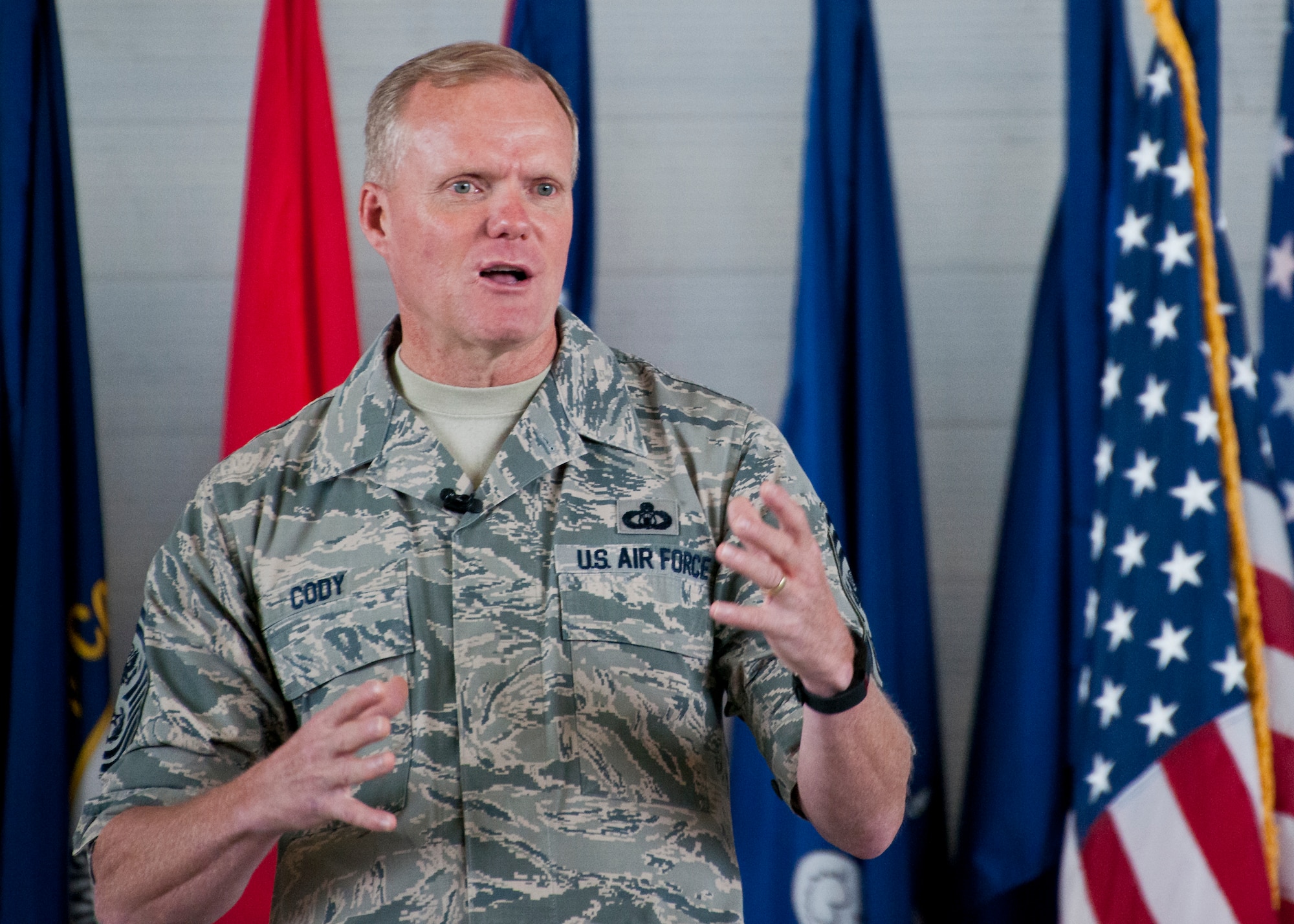 Chief Master Sgt. of the Air Force James Cody speaks to an audience of Airmen at an “All Call” Oct. 2 at Eglin Air Force Base, Fla.  Cody and Air Force Chief of Staff Mark A. Welsh III spent visited Eglin and Hurlburt Field to engage with Airmen.  (U.S. Air Force photo/Samuel King Jr.)