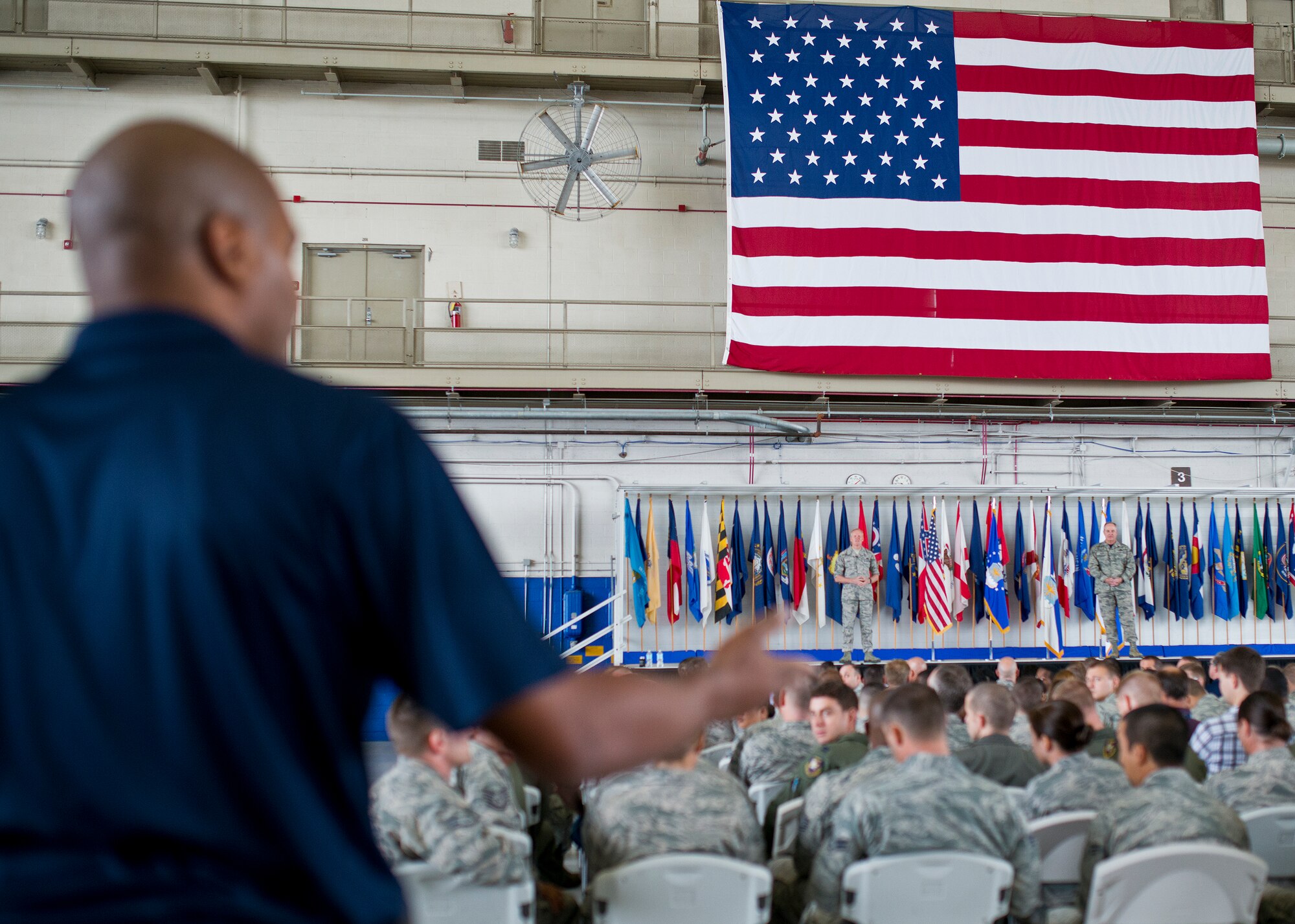 An NCO from the 96th Force Support Squadron asks a question to Air Force Chief of Staff Gen. Mark A. Welsh III and Chief Master Sgt. of the Air Force James Cody during an “All Call” Oct. 2 at Eglin Air Force Base, Fla.  The Air Force leaders visited Eglin and Hurlburt Field, to engage with Airmen.  (U.S. Air Force photo/Samuel King Jr.)