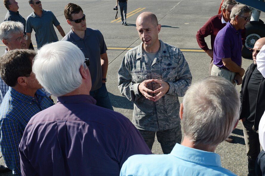 Lt. Col. John Knack, 62nd Maintenance Group deputy commander, speaks to members of the Vancouver Executive Association about a C-17 Globemaster III on the McChord Field flight line, Sept. 30, 2015, at Joint Base Lewis-McChord, Wash. The team received a tour of the aircraft as well as interacted with Airmen throughout their tour to better understand Team McChord’s mission. (U.S. Air Force photo/Senior Airman Divine Cox)  