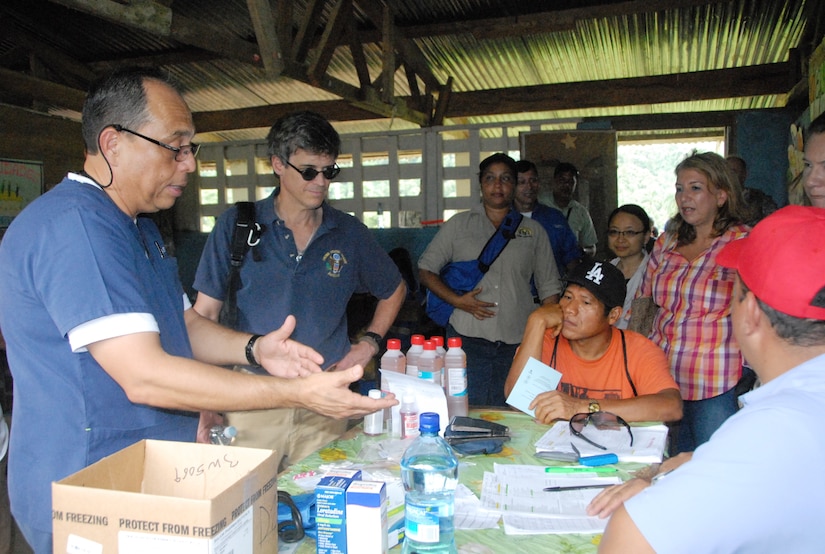 CORONTE, Panama – Dr.  Guillermo Saenz (left), a medical liaison from JTF-Bravo’s Medical Element, explains the different treatments and procedures that are being provided during a medical readiness training exercise in Coronte, Panama, September 24, 2015, to Kevin O’Reilly (left center), Chargé d’Affaires for the U.S. Embassy in Panama. Service members and civilian medical providers from Joint Task Force-Bravo joined the Panamanian Ministry of Health, along with members from the U.S. Embassy in Panama to provide free health care in the region. (U.S. Army photo by Sgt. Tia Sokimson)