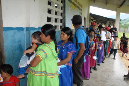 QUEBRADA NEGRA, Panama - Mothers wait in line to receive medical care with their children in Quebrada Negra, Panama, September 23, 2015, during a medical readiness training exercise that involved members from Joint Task Force-Bravo and the Panamanian Ministry of Health. Exercises such as these enhance readiness, foster partner nation response and capacity, and also validate JTF-Bravo’s medical expeditionary capabilities. (U.S. Army photo by Sgt. Tia Sokimson) 