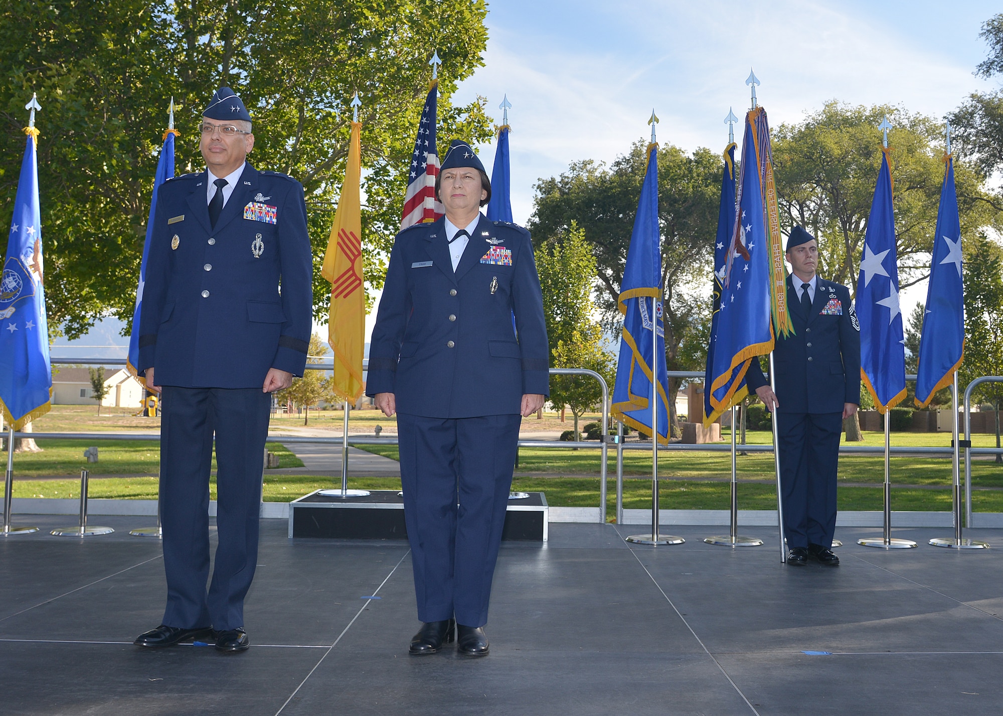 Maj. Gen. Jack Weinstein, 20th Air Force commander, stands with Maj. Gen. Sandra Finan, former Air Force Nuclear Weapons Center commander, at the 377th Air Base Wing transfer ceremony. The AFNWC transferred command of the wing to Air Force Global Strike Command at a ceremony Oct. 1 at Hardin Field. (Photo by Todd Berenger)