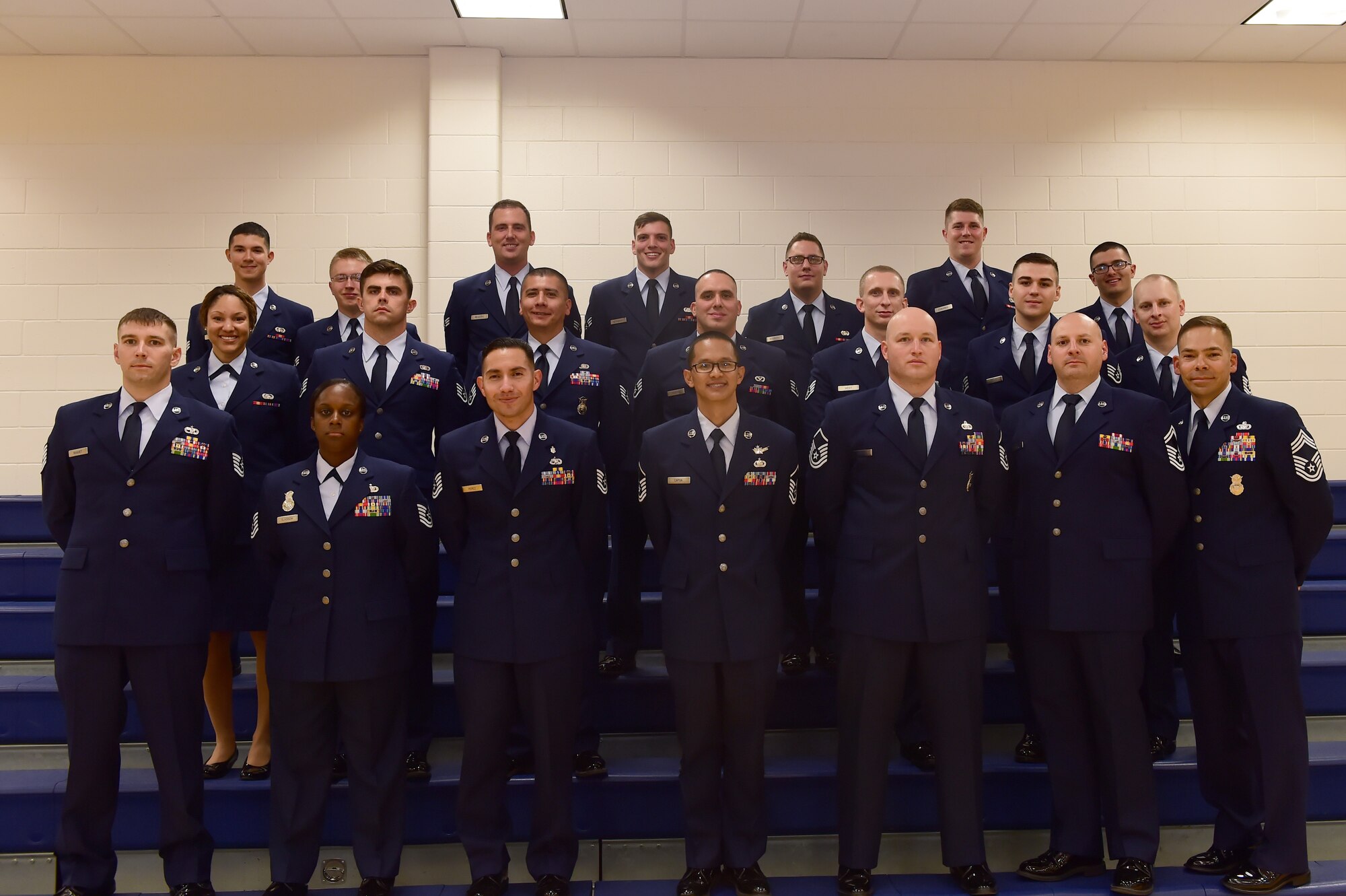Team Buckley members were promoted to their next ranks Sept. 30, 2015, at the Fitness Center on Buckley Air Force Base, Colo. A promotion ceremony is a time-honored tradition in the Air Force, allowing co-workers, family and friends to support and congratulate Airmen on their promotion. (U.S. Air Force photo by Airman 1st Class Luke Nowakowski/Released)