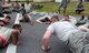 Airmen from the 8th Maintenance Squadron phase flight participate in a push up challenge during an 8th Maintenance Group Safety Olympics event at Kunsan Air Base, Republic of Korea, Sept. 30, 2015. The purpose of the event was to highlight the importance of workplace safety while simultaneously drawing camaraderie among all Airmen in the 8th MXG. (U.S. Air Force photo by Staff Sgt. Nick Wilson/Released)