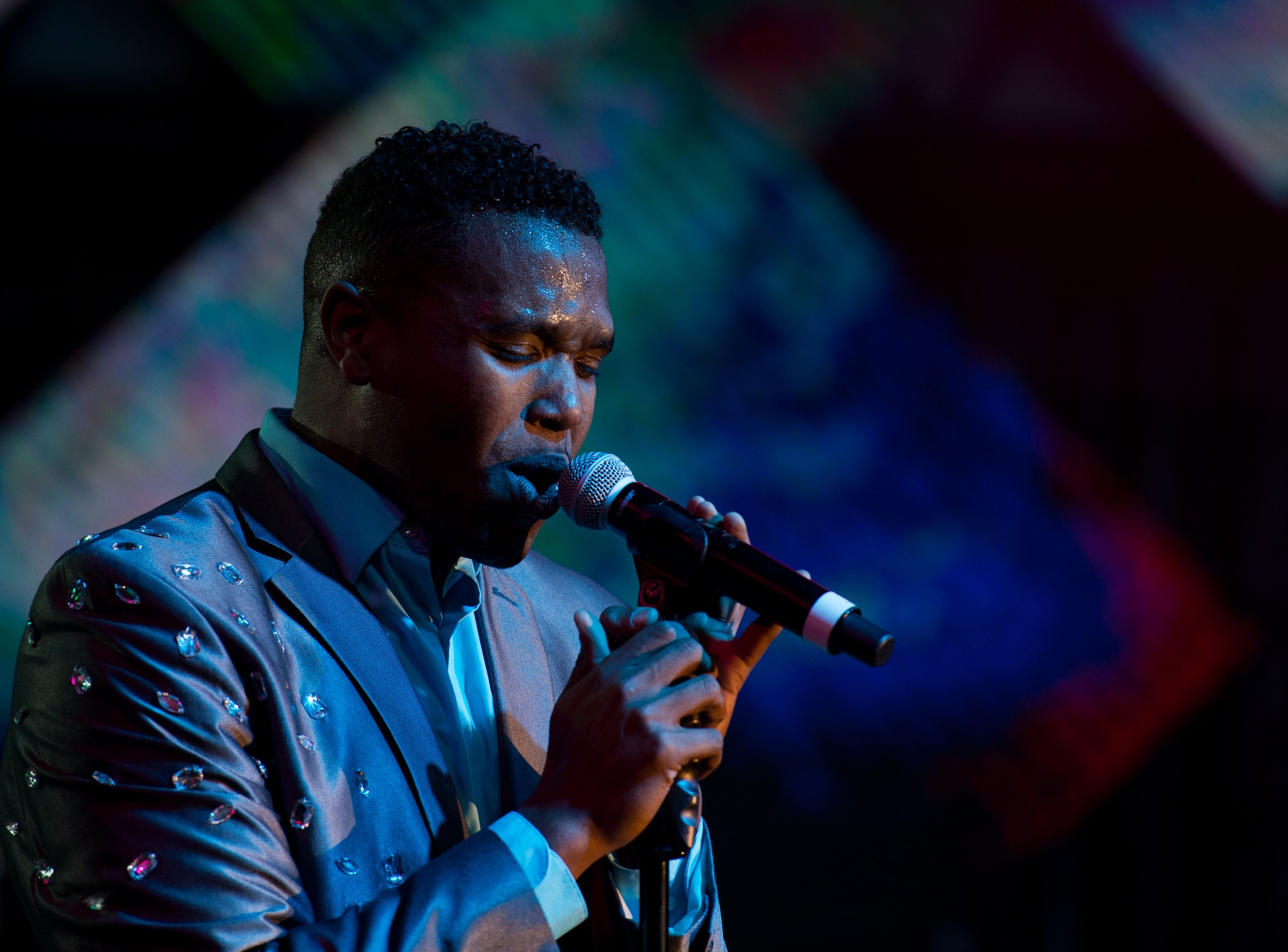 Senior Airman Jordan Whitehead, 459th Aerospace Medicine Squadron medical serviceman, performs during a Tops in Blue concert Sept. 27, 2015, on Ramstein Air Base, Germany. Whitehead was stationed at Joint Base Andrews Naval Air Facility, Maryland when he was selected to perform with Tops in Blue. (U.S. Air Force photo/ Senior Airman Jonathan Stefanko)