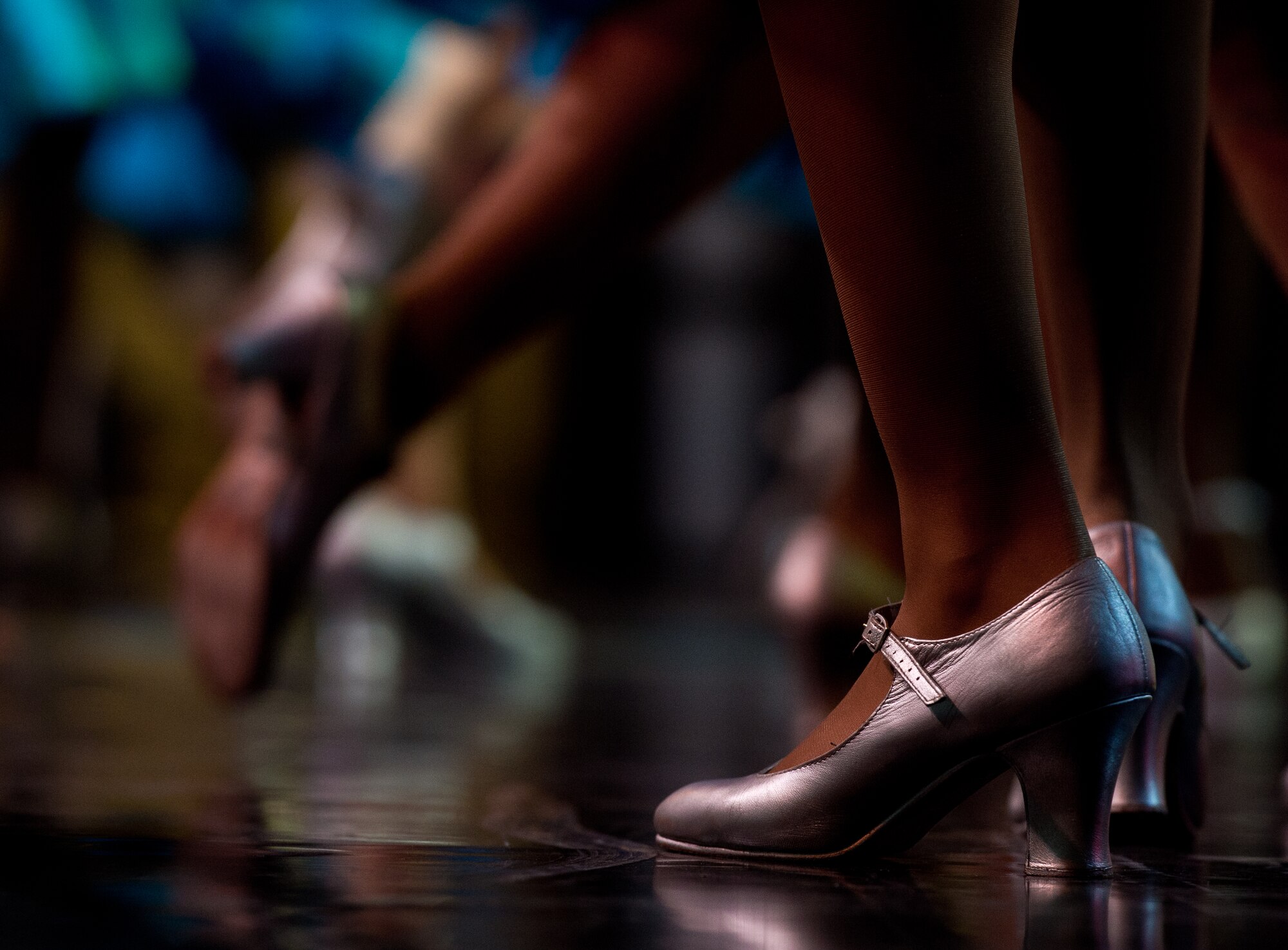 Tops in Blue performers dance on stage during a concert held Sept. 27, 2015, on Ramstein Air Base, Germany. The goal of Tops in Blue is to enhance mission productivity for Air Force members and their families, especially those in remote and isolated locations (U.S. Air Force photo/ Senior Airman Jonathan Stefanko)