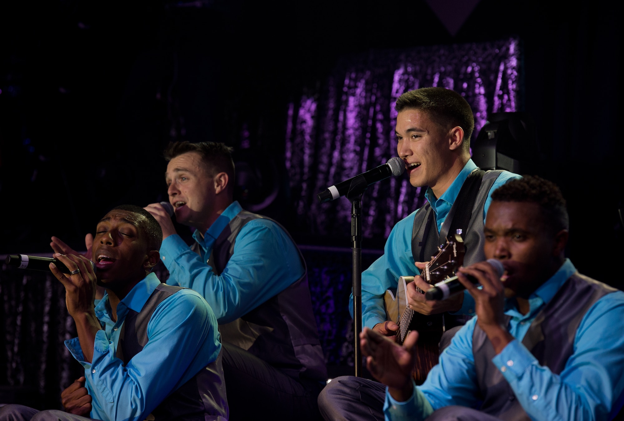 Tops in Blue Airmen perform during a concert Sept. 27, 2015, on Ramstein Air Base, Germany. The goal of Tops in Blue is to enhance mission productivity for Air Force members and their families, especially those in remote and isolated locations (U.S. Air Force photo/ Senior Airman Jonathan Stefanko)