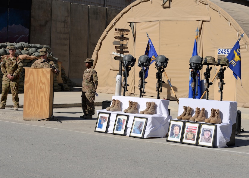 U.S Air Force Maj. Met Berisha, 455th Expeditionary Security Forces Squadron commander, shares his condolences for six Airmen lost during a fallen comrade memorial ceremony Oct. 3, 2015, at Bagram Airfield, Afghanistan. The six Airmen, four who were pilots and crew members, Capts. Jordan Pierson and Jonathan Golden, Staff Sgt. Ryan Hammond and Senior Airman Quinn Johnson-Harris, and two who were security forces fly away security team members, Airman 1st Class Kcey Ruiz and Senior Airman Nathan Sartain, lost their lives when their C-130J crashed shortly after take-off from Jalalabad Airfield in Afghanistan, Oct. 2, 2015. (U.S. Air Force photo by Senior Airman Cierra Presentado/Released)