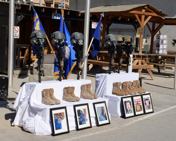 A fallen comrade memorial ceremony was held in honor of six Airmen who died recently while serving their country Oct. 3, 2015, at Bagram Airfield, Afghanistan. The six Airmen, four who were pilots and crew members, Capts. Jordan Pierson and Jonathan Golden, Staff Sgt. Ryan Hammond and Senior Airman Quinn Johnson-Harris, and two who were security forces fly away security team members, Airman 1st Class Kcey Ruiz and Senior Airman Nathan Sartain, lost their lives when their C-130J crashed shortly after take-off from Jalalabad Airfield in Afghanistan, Oct. 2, 2015. (U.S. Air Force photo by Senior Airman Cierra Presentado/Released)
