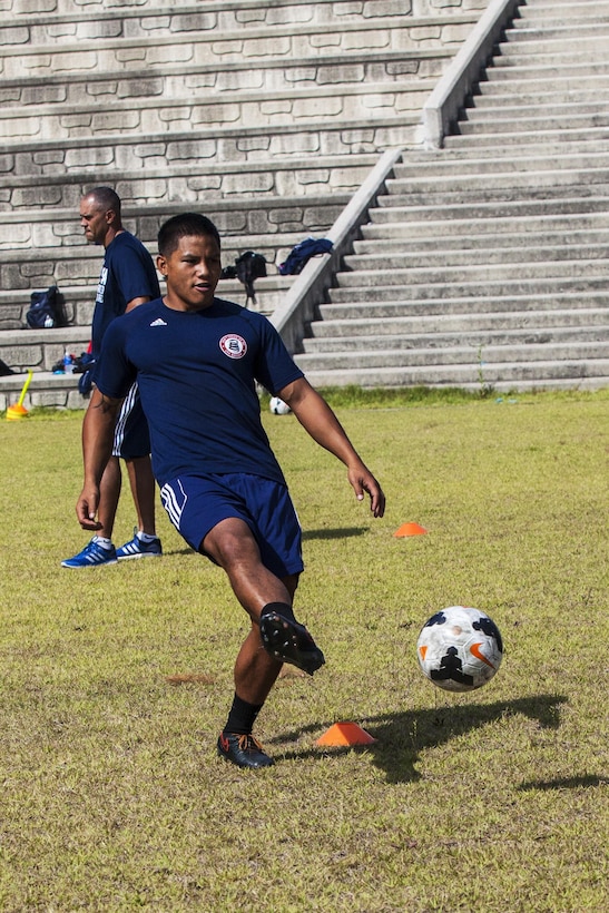 United States Men’s Soccer Team player PO2 Christopher Afaisen practices for the 2015 6th CISM World Games. The CISM World Games provides the opportunity for the athletes of over 100 different Nations to come together and enjoy friendship through sport. The sixth annual CISM World Games are being held aboard Mungyeong, South Korea, Sept. 30 - Oct. 11. (Photo by Sgt. Ashley N. Cano)