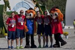 United States Men’s Soccer Team Members pose for pictures with the Mascots for the 2015 6th CISM World Games during the Athlete Village Opening Ceremony. The CISM World Games provides the opportunity for the athletes of over 100 different Nations to come together and enjoy friendship through sport. The sixth annual CISM World Games are being held aboard Mungyeong, South Korea., Sept. 30 - Oct. 11.  (Photo by Sgt. Ashley N. Cano)