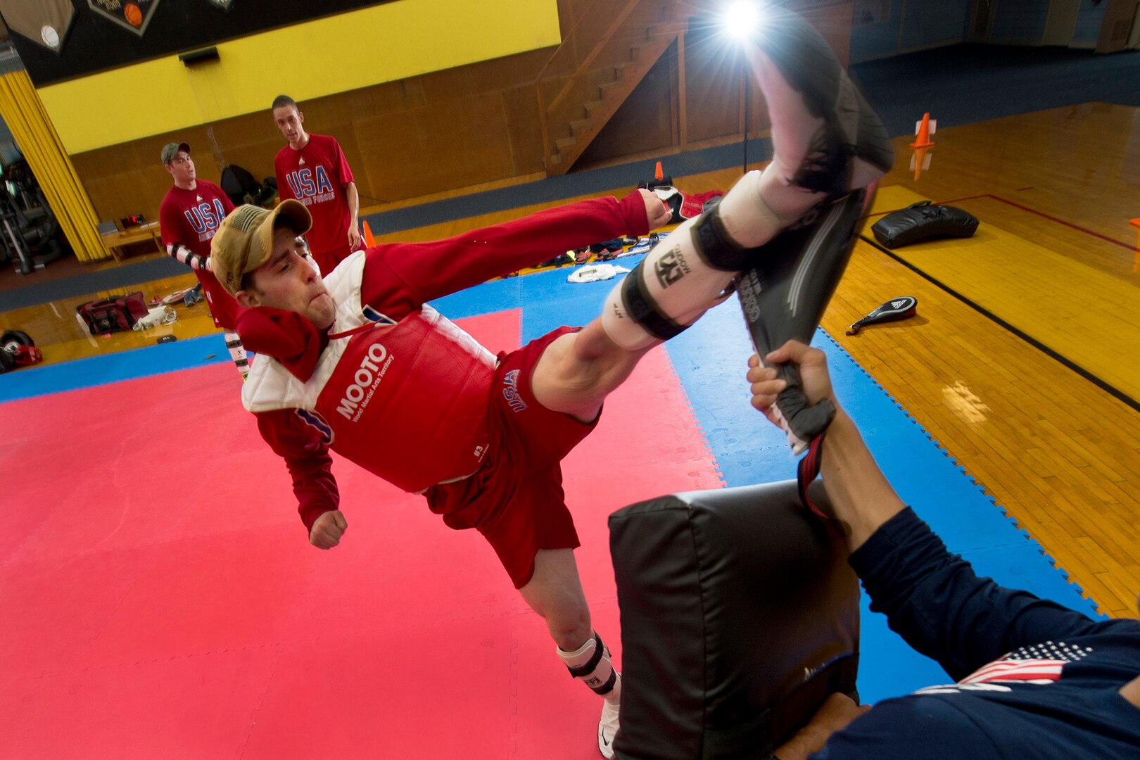 Army Sgt. Michael Warner kicks a target during U.S. Armed Forces Tae Kwon Do Team practice at Fort Indiantown Gap, Pa., Sept. 21, 2015. The team is training for the 2015 Military World Games in Mungyeong, South Korea, scheduled for Oct. 2 through Oct. 11. (DoD News photo by EJ Hersom)