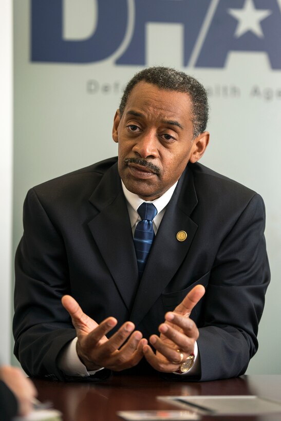 Assistant Secretary of Defense for Health Affairs Dr. Jonathan Woodson speaks about the Defense Health Agency's accomplishments as the agency celebrates its second anniversary and its attainment of full operating capability in Falls Church, Va., Oct. 1, 2015. DoD photo by EJ Hersom