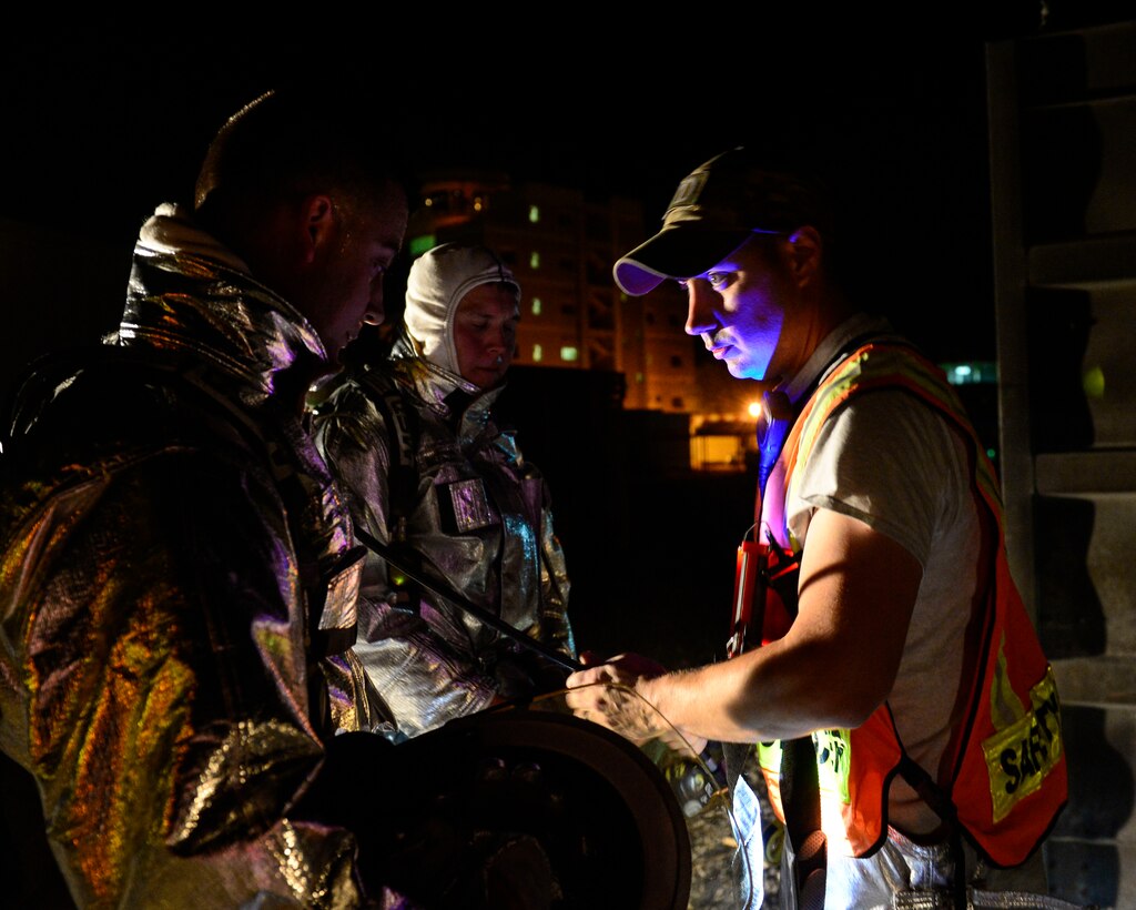 U.S. Air Force Staff Sgt. James Earnhardt, 386th Civil Engineer Squadron fire department search and rescue driver operator, performs a safety check in preparation for Fire Prevention Week at an undisclosed location in Southwest Asia, Sept. 30, 2015. Fire protection specialists are knowledgeable in the principles and operations of fighting building, aircraft, hazardous materials, wild land and miscellaneous fires, which aids in the elimination of the global threats imposed in the Middle East. (U.S. Air Force photo by Senior Airman Racheal E. Watson/Released)