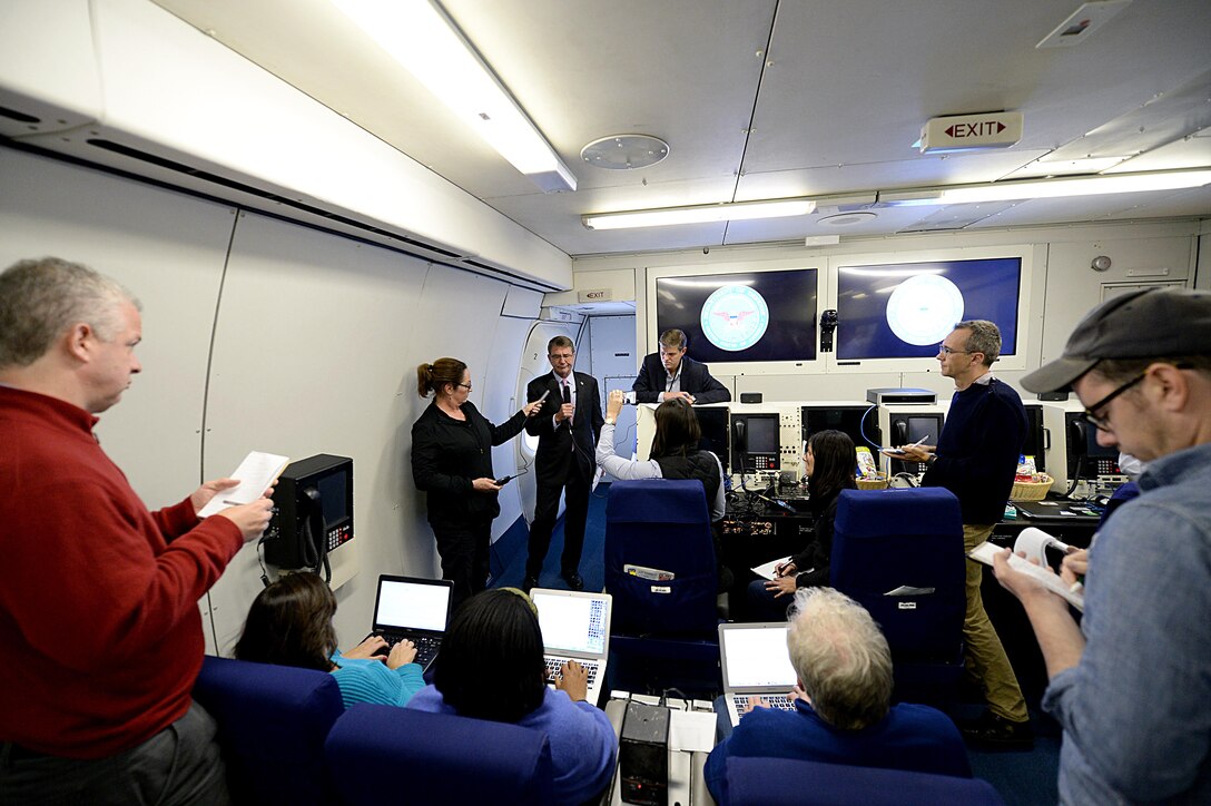 U.S. Defense Secretary Ash Carter briefs reporters while en route to Madrid, Oct. 4, 2015. Carter is on a five-day trip to Spain, Italy, Belgium and the United Kingdom, where he will visit U.S. service members, meet with defense counterparts and attend the NATO Defense Ministerial Conference. DoD photo by U.S. Army Sgt. 1st Class Clydell Kinchen
