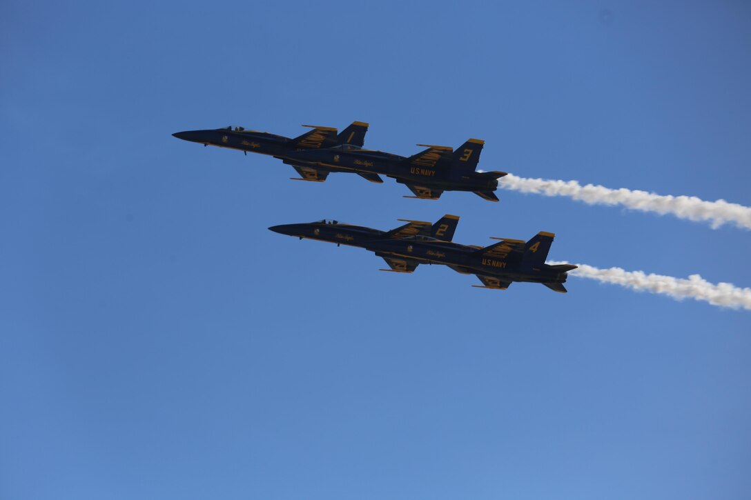 Four U.S. Navy Blue Angels perform an aerobatic maneuver during the 2015 MCAS Miramar Air Show aboard Marine Corps Air Station Miramar, California, Oct. 3. The Blue Angels show audiences around the world the capabilities of the armed forces’ aircraft. (U.S. Marine Corps photo by Sgt. Melissa Wenger/Released)